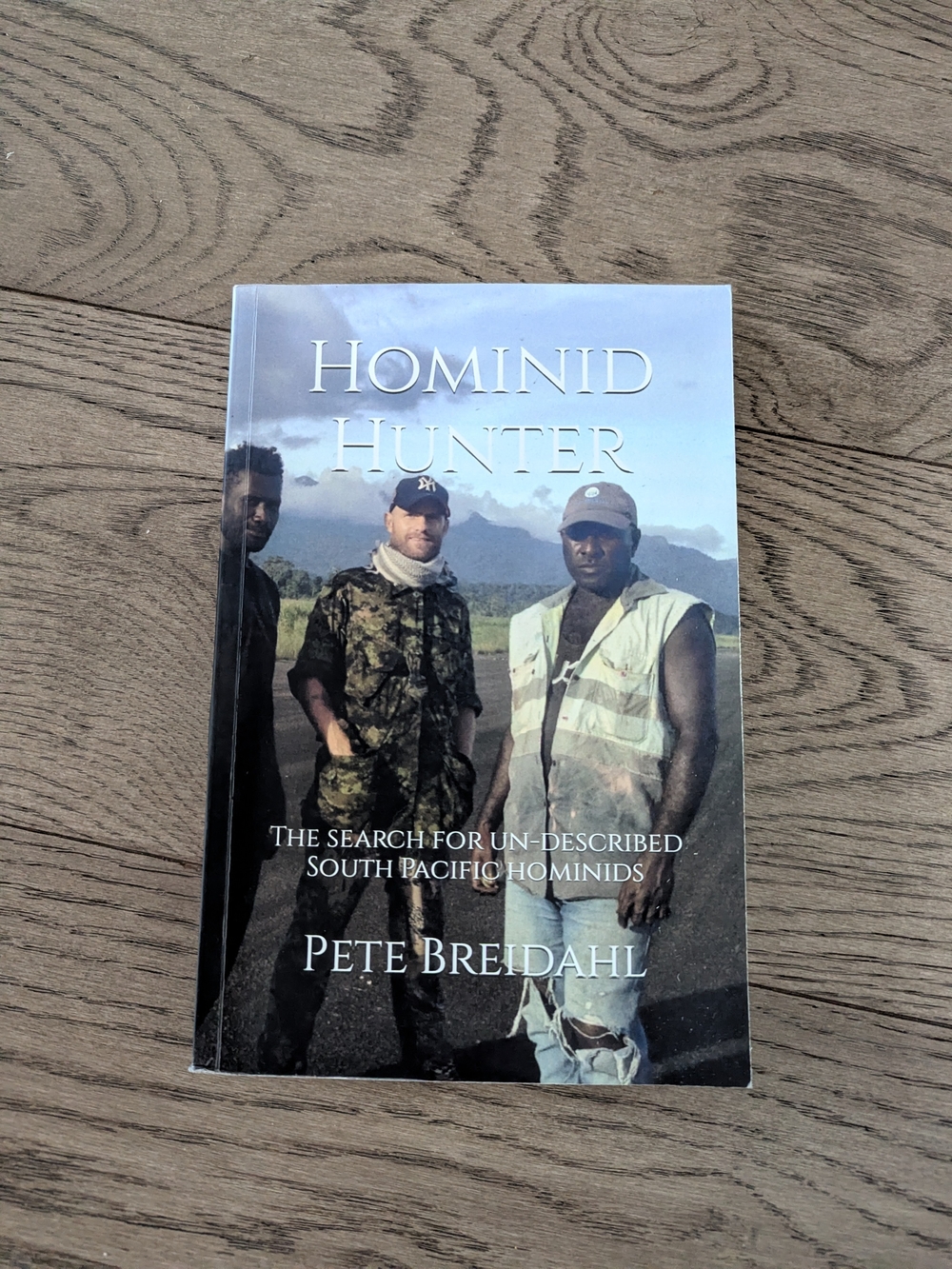 Hominid Hunter Paperback Book - Blue/Gray Cover